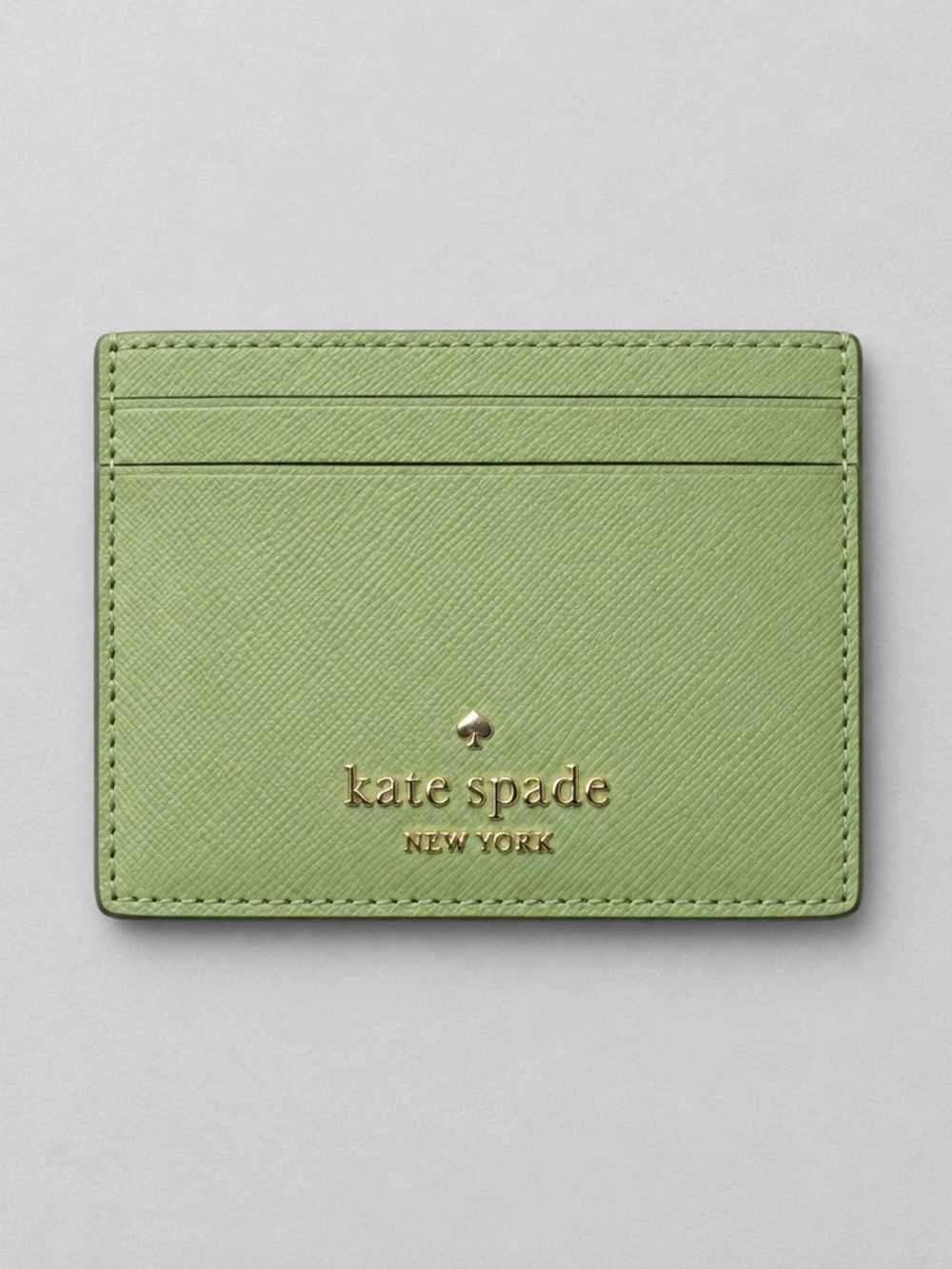 kate spade lime green saffiano leather cardholder with gold logo NWOT